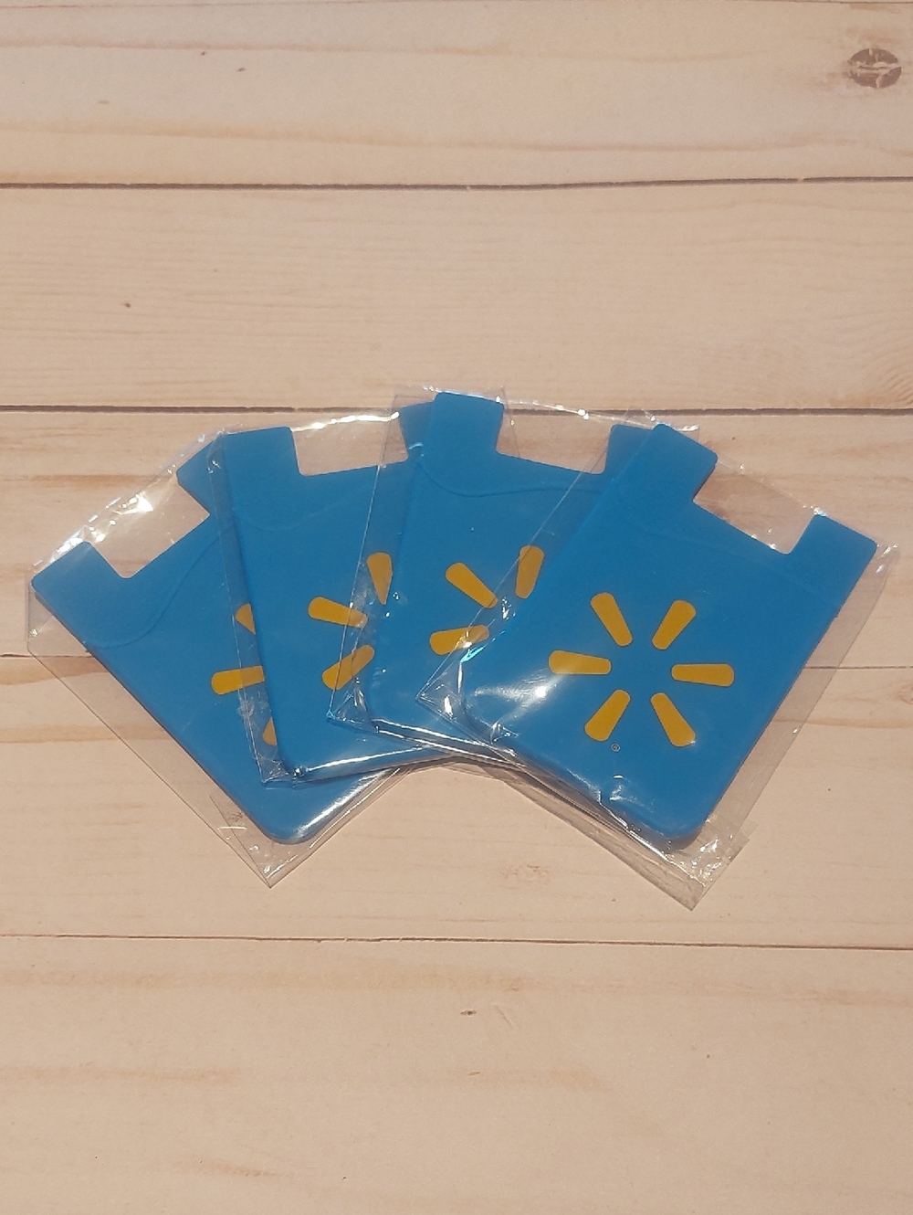 Blue Silicone Stick-On Phone Card Holder with Yellow Logo Accent